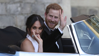Meghan Markle and Prince Harry, now the Duke and Duchess of Sussex, leave Windsor Castle on Saturday after their wedding.